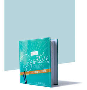 Image of the hardcover binder of the practice guide and workbook for Create a Signature You Love